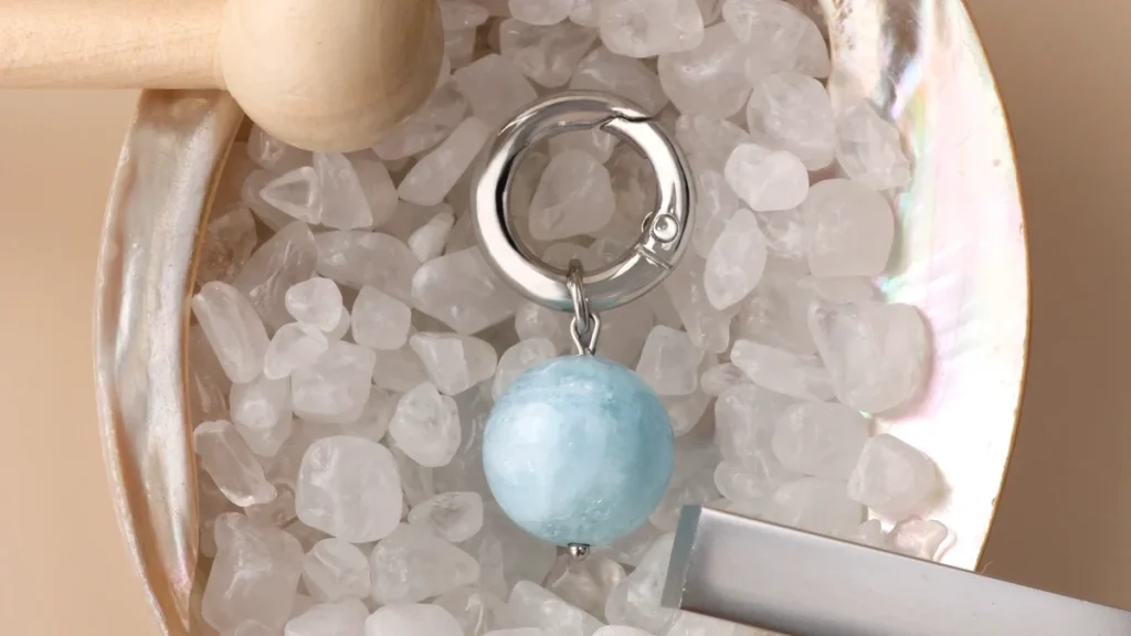 Cleansing pet collar crystal on a natural quartz bed