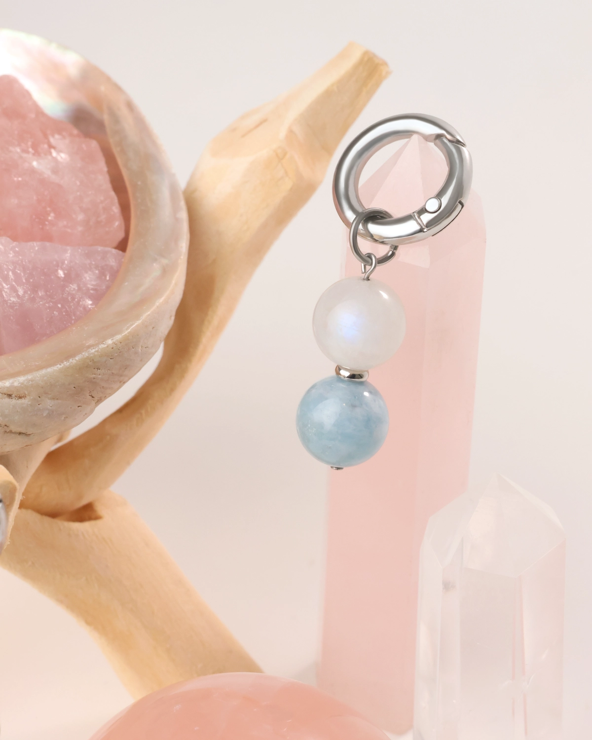 LuStar charm with moonstone and aquamarine beads among rose and clear quartz